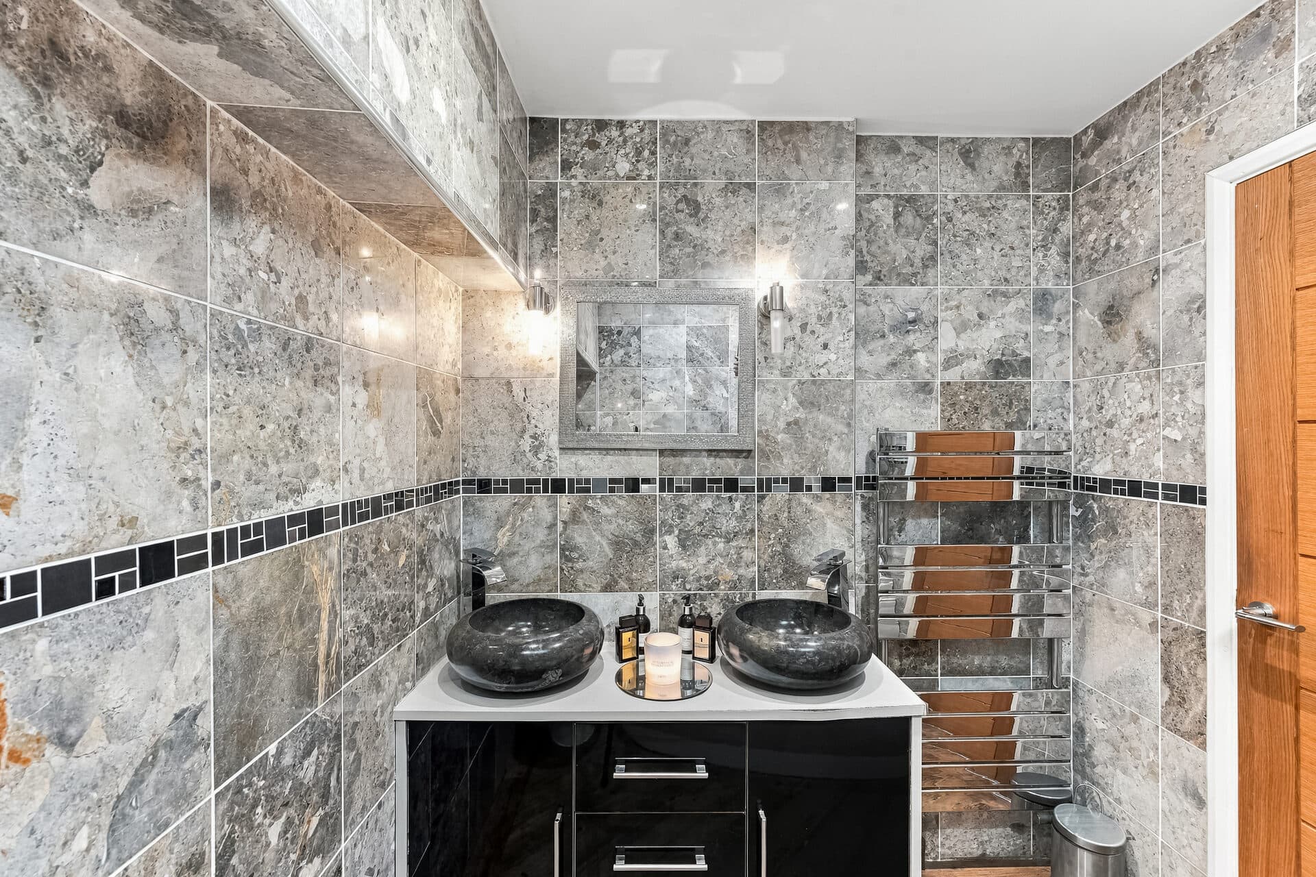 Ensuite bathroom with twin stone vessel basins