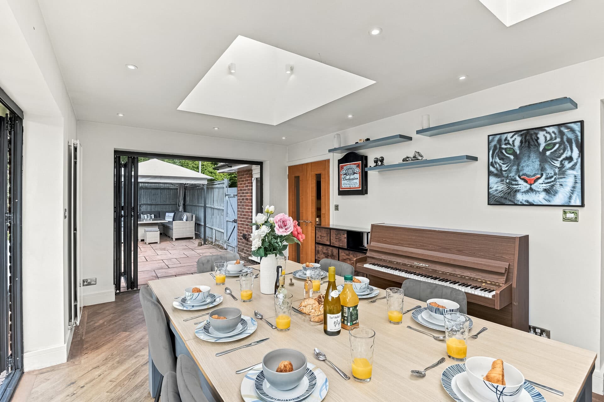Snug living area with TV, guitar and garden access